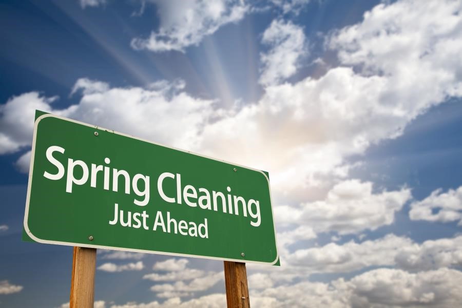 road sign that reads Spring Cleaning Just Ahead