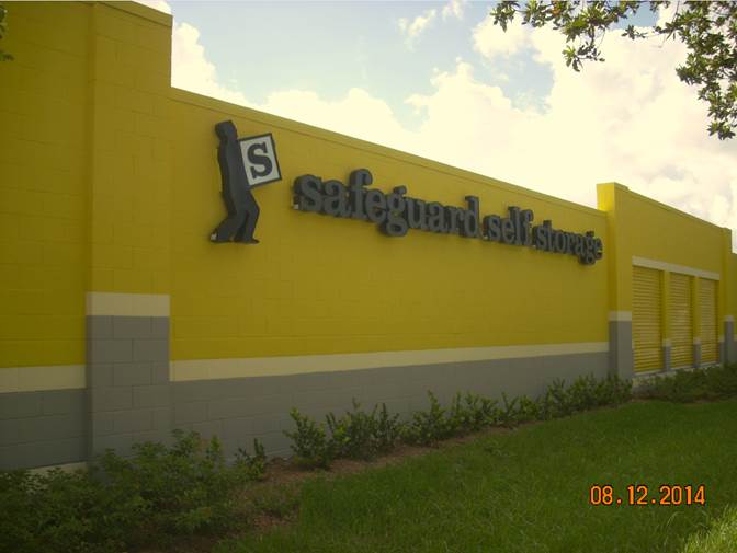 The yellow exterior of Safeguard Self Storage's Palmetto Expressway facility in Miami, FL