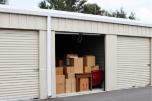 An open storage unit with boxes.